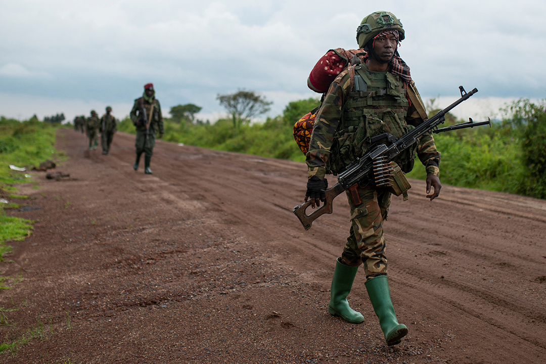 Congolese M23 rebels are seen as they withdraw from the three antennes location in Kibumba, near Goma, North Kivu province of the Democratic Republic of Congo, December 23, 2022.