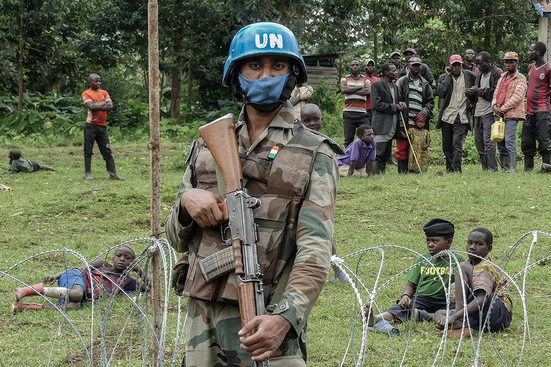 A peacekeeper holds his weapon during a patrol around the new base set up in Rugari as the population watches the military in eastern Democratic Republic of Congo, January 28, 2022.