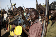 Jikany Nuer White Army fighters holds their weapons in Upper Nile State